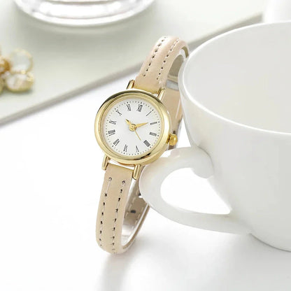 Elegant women's quartz leather wristwatch with a minimalist, timeless design
