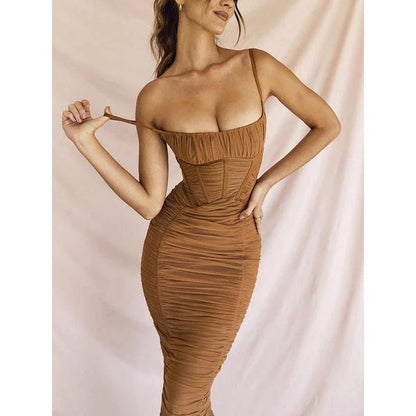 Elegant black maxi dress with spaghetti straps and a backless design, perfect for summer events and nights out.