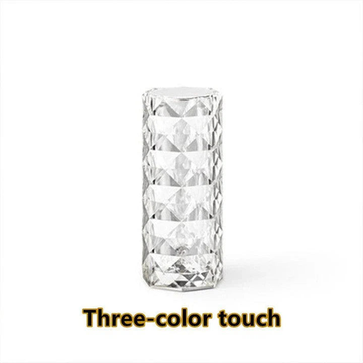 Elegant diamond-inspired crystal lamp with touch-sensitive dimming controls, providing adjustable ambient lighting for bedrooms and living spaces.