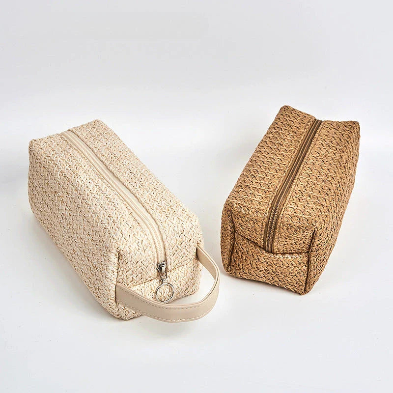 Elegant and Practical Cosmetic Bag made from high-quality straw material with a unique knitting pattern, providing ample storage and a stylish accessory for modern women.