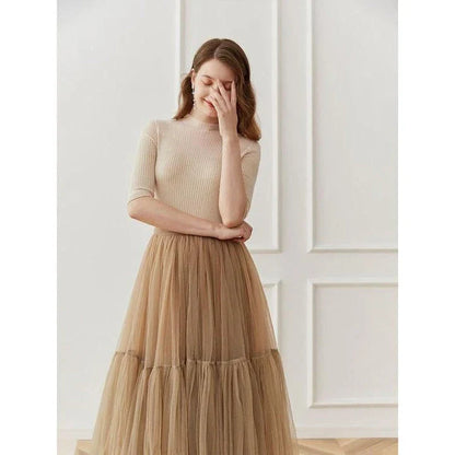 Elegant and comfortable women's half sleeve knitted top in black color with a stylish and sophisticated design