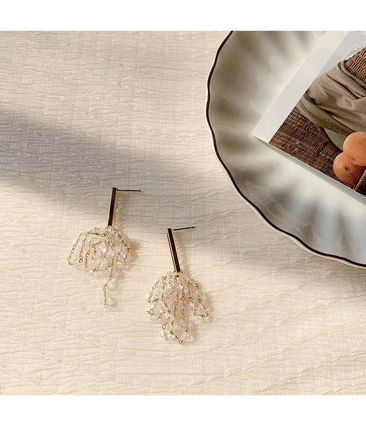 Elegant Crystal Tassel Grape Earrings in Gold, featuring a sophisticated geometric design and a mesmerizing crystal tassel detail