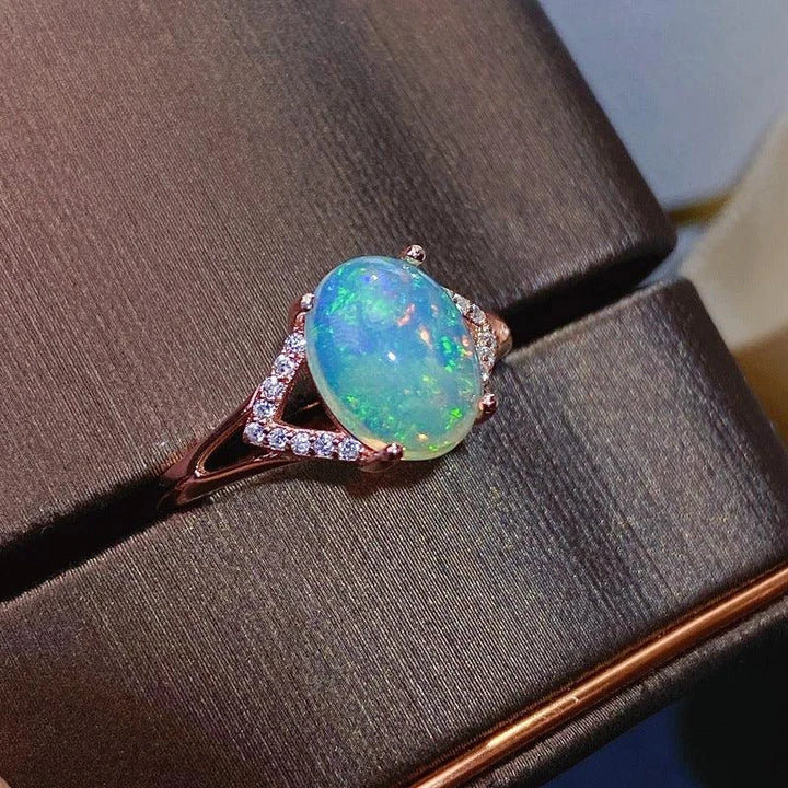 Elegant 925 silver ring featuring a captivating natural Australian opal with a mesmerizing play of colors
