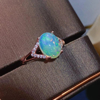 Elegant 925 silver ring featuring a captivating natural Australian opal with a mesmerizing play of colors