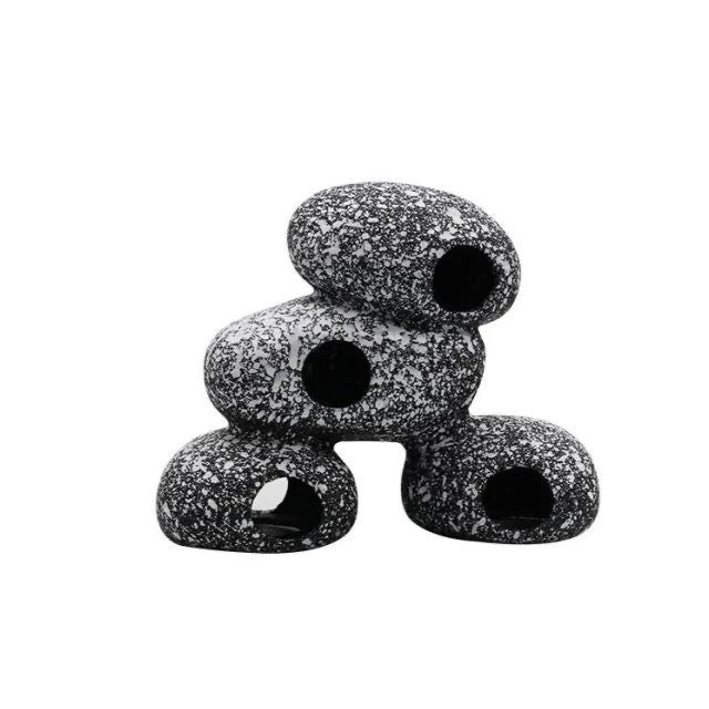 Realistic and natural-looking fish tank decor made of premium resin material, designed to provide a safe haven for fish and shrimp breeding and hiding