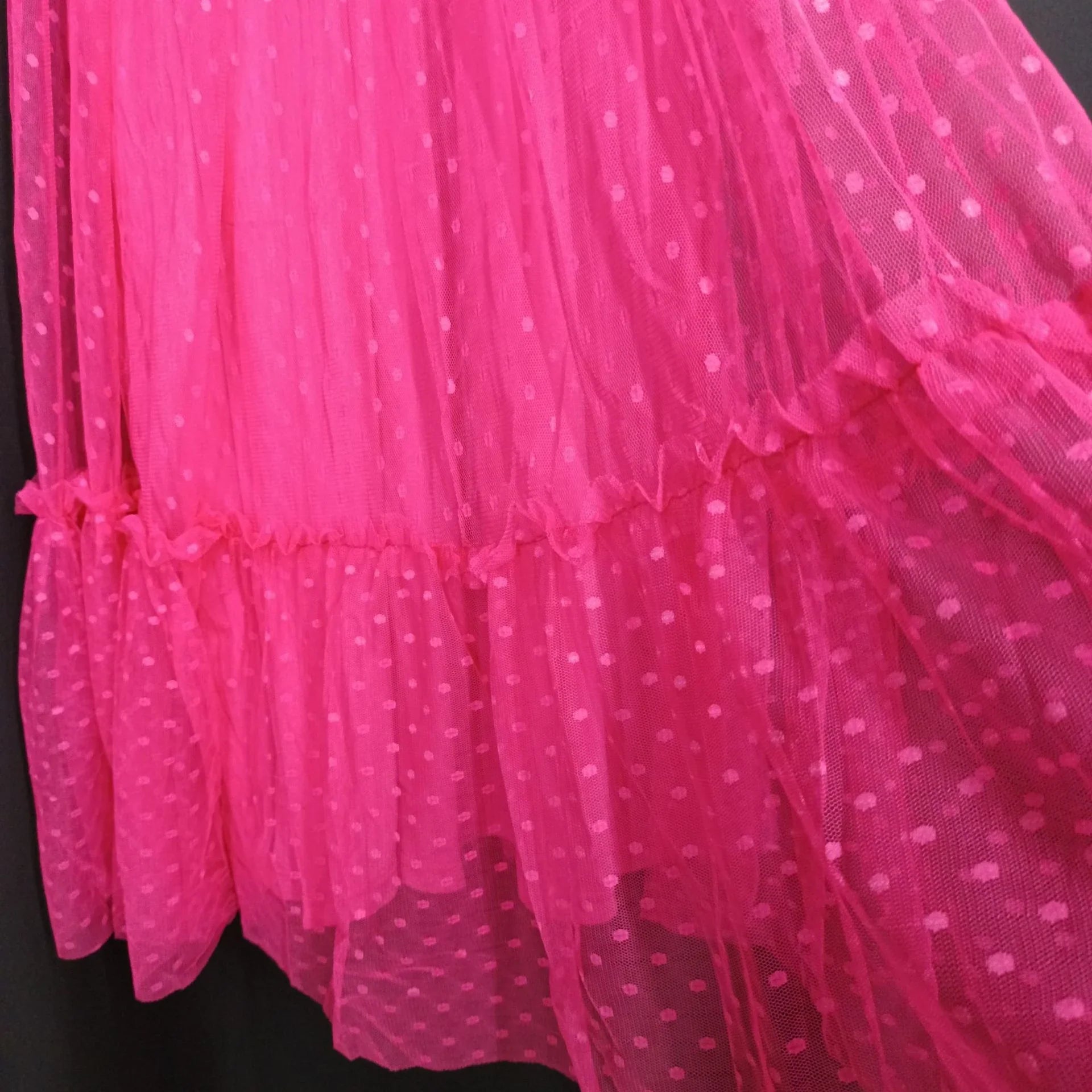 Fairy-inspired dress with mid-length silhouette, lace-up details, and luxurious polyester fabric