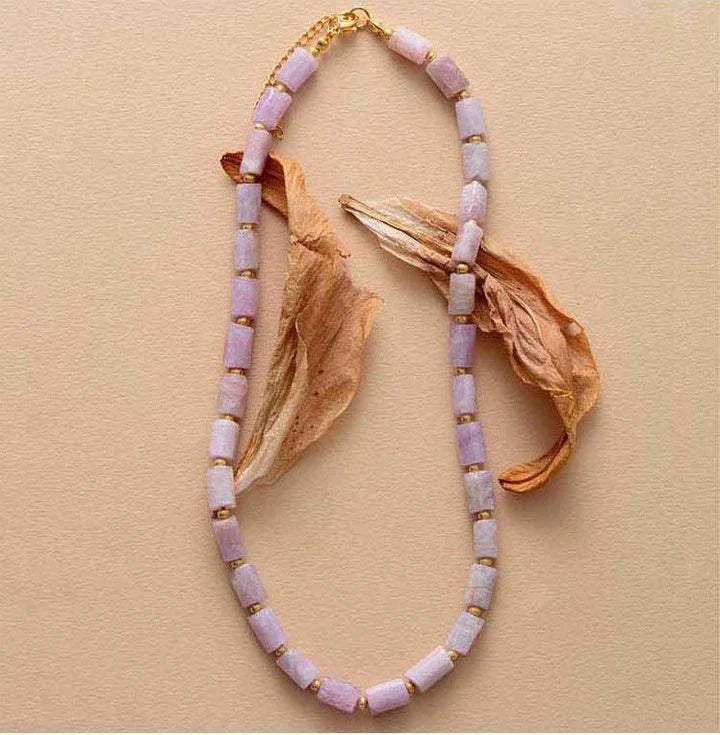 Elegant red natural stone necklace with an adjustable stainless steel chain, perfect for adding a touch of natural beauty to any outfit.