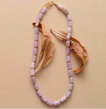 Elegant red natural stone necklace with an adjustable stainless steel chain, perfect for adding a touch of natural beauty to any outfit.
