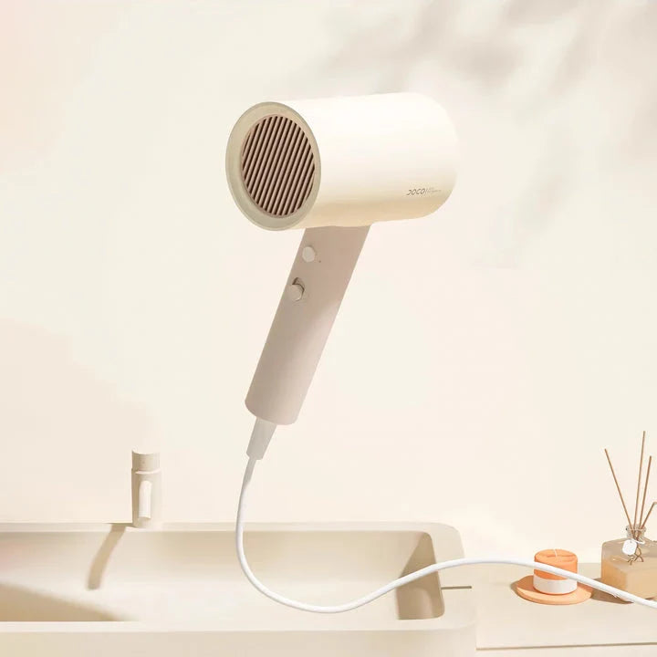 High-power anion hair dryer with foldable design, infrared heating, and dual heat and speed settings for quick drying and healthy hair