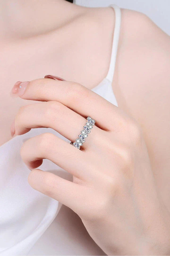 Elegant 925 sterling silver ring featuring a captivating 0.2-carat Moissanite center stone surrounded by a sparkling halo of Moissanite accent gems