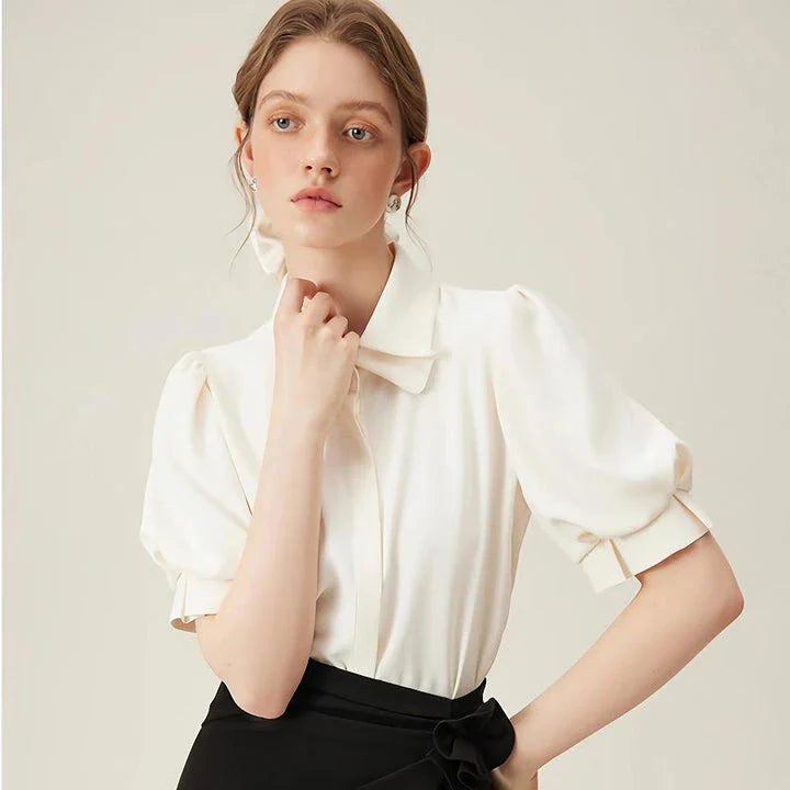 Elegant summer polo collar shirt for professional women, featuring a sophisticated design, breathable fabric, and versatile style.