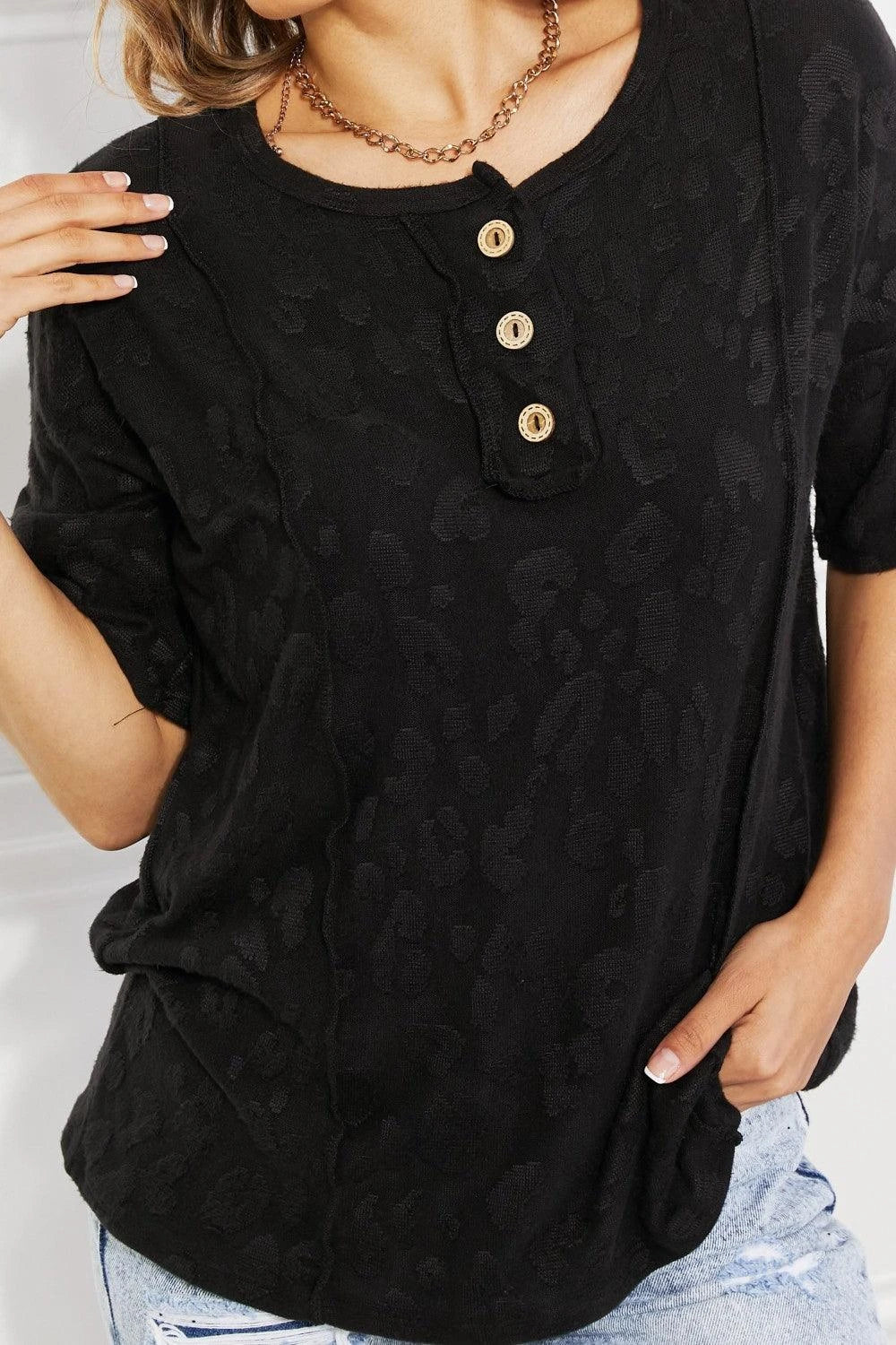 Stylish animal print textured blouse with a flattering fit and comfortable fabric for versatile wear