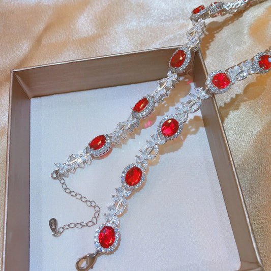 Luxury Imitation Ruby Dove Egg Necklace with Full Diamonds - Captivating pendant, dazzling diamonds, and luxurious imitation ruby for elegant style.