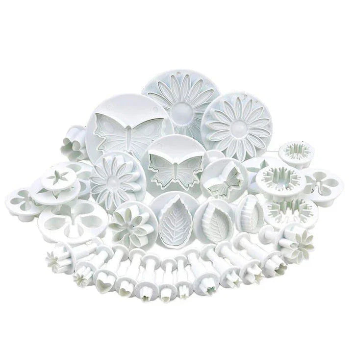 A set of 33 decorative pastry cutters in various shapes and sizes, made from durable, food-grade plastic for precise, clean cuts on cookies, pies, and other baked goods.