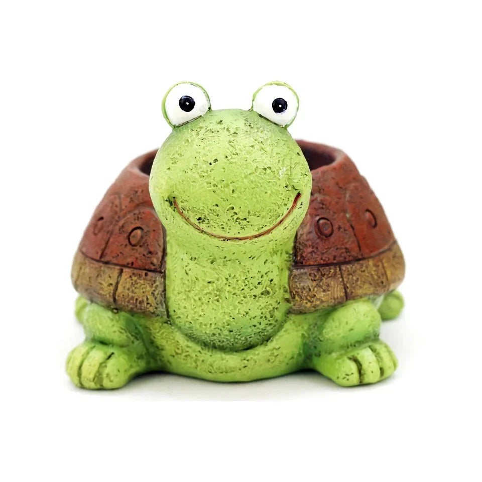 Charming gray cartoon turtle planter holding small potted succulents and cacti