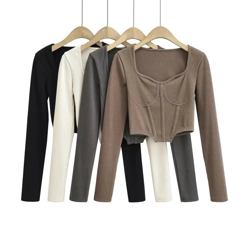 A stylish slim-fit short autumn top with an open waist design, made of premium polyester fabric with long sleeves and a square collar.