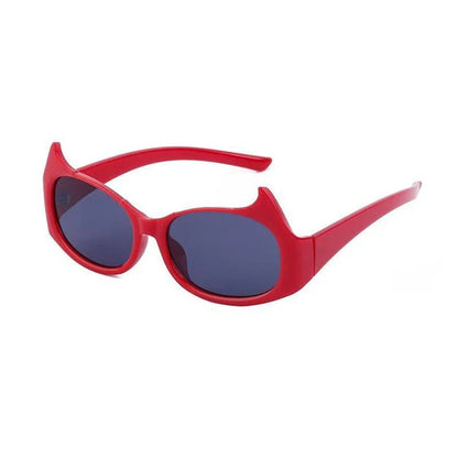 Stylish cat-eye sunglasses with oversized frames, semi-rimless design, and punk-inspired detailing for a timeless, glamorous look