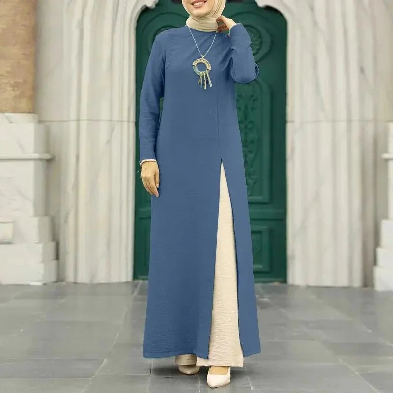 Elegant polyester dress with long sleeves, high slit hem, and available in caramel, black, blue, green, and pink colors