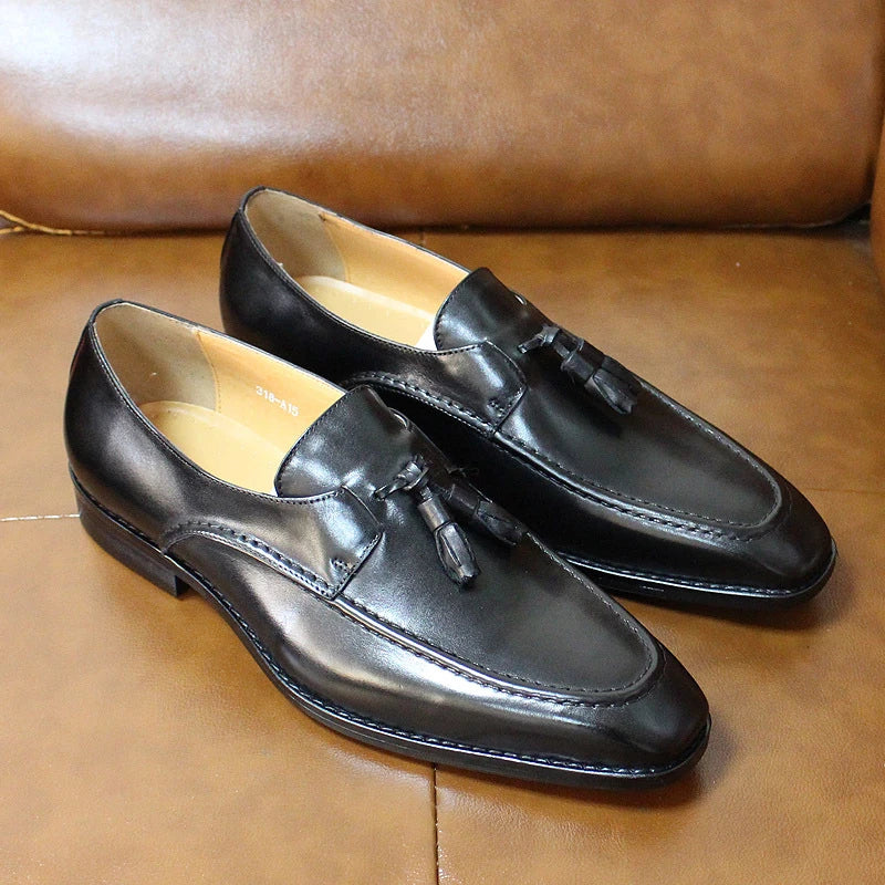 Premium casual leather loafers for men in black, brown, and blue colors with a sleek, low-profile design and durable rubber soles