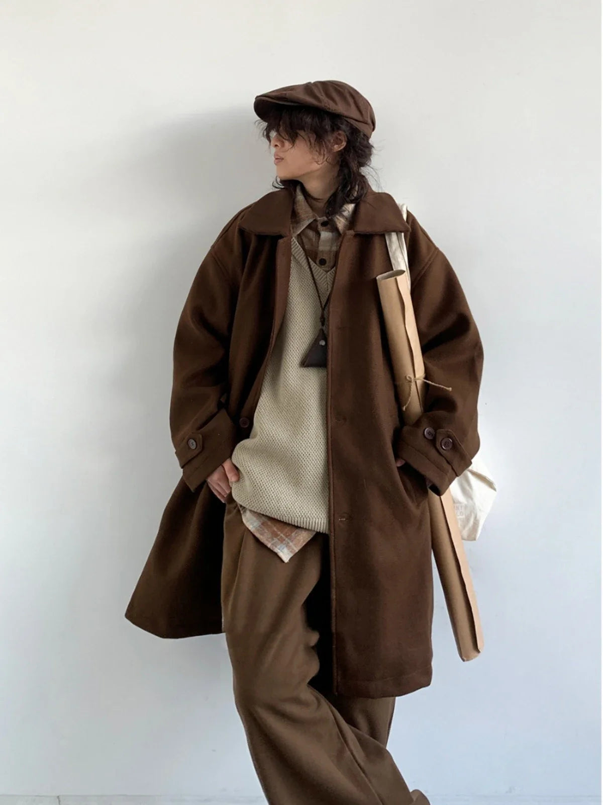 Premium Japanese-inspired retro wool coat in a classic brown color, featuring a single-breasted design and lapel collar for a polished look.