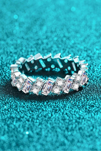 Elegant 925 sterling silver ring featuring a captivating 0.2-carat Moissanite center stone surrounded by a sparkling halo of Moissanite accent gems