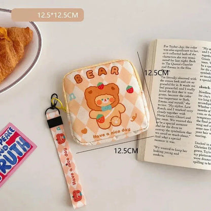 Adorable cartoon nylon cosmetic bag with secure zipper closure and compact, box-shaped design