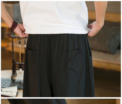 Men's Chinese-inspired harem pants made of luxurious ice silk fabric with a relaxed, draped silhouette