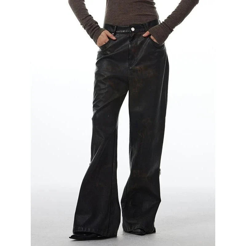 Model wearing chic high-waist straight leg leather pants in black color