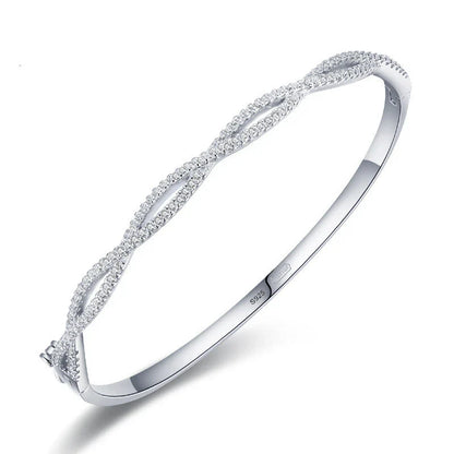 Elegant silver bracelet with a captivating wave-like design, a premium micro-set jewelry piece crafted with superior Seiko technology