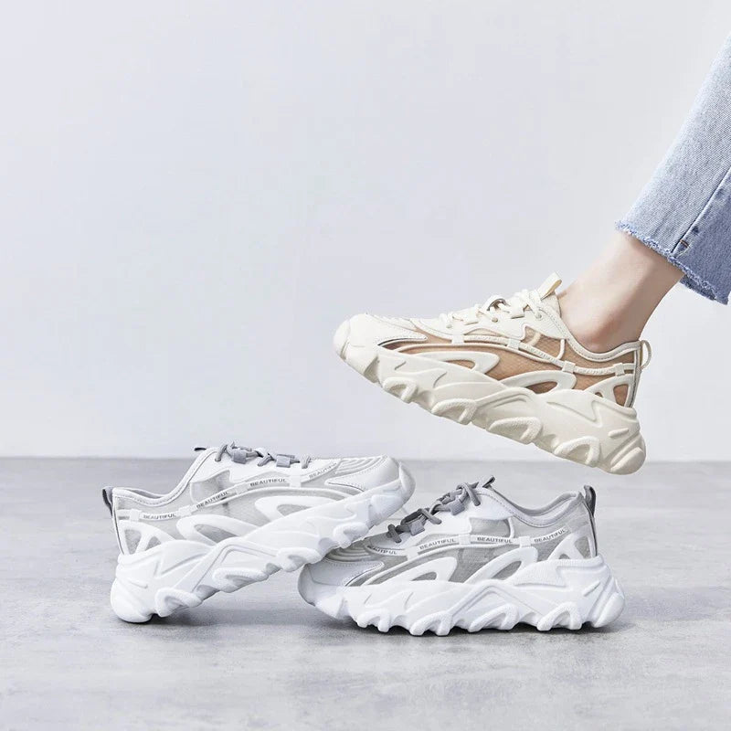 Premium white platform sneakers with thick soles, showcasing a trendy 'daddy shoe' style for comfortable and stylish everyday wear.