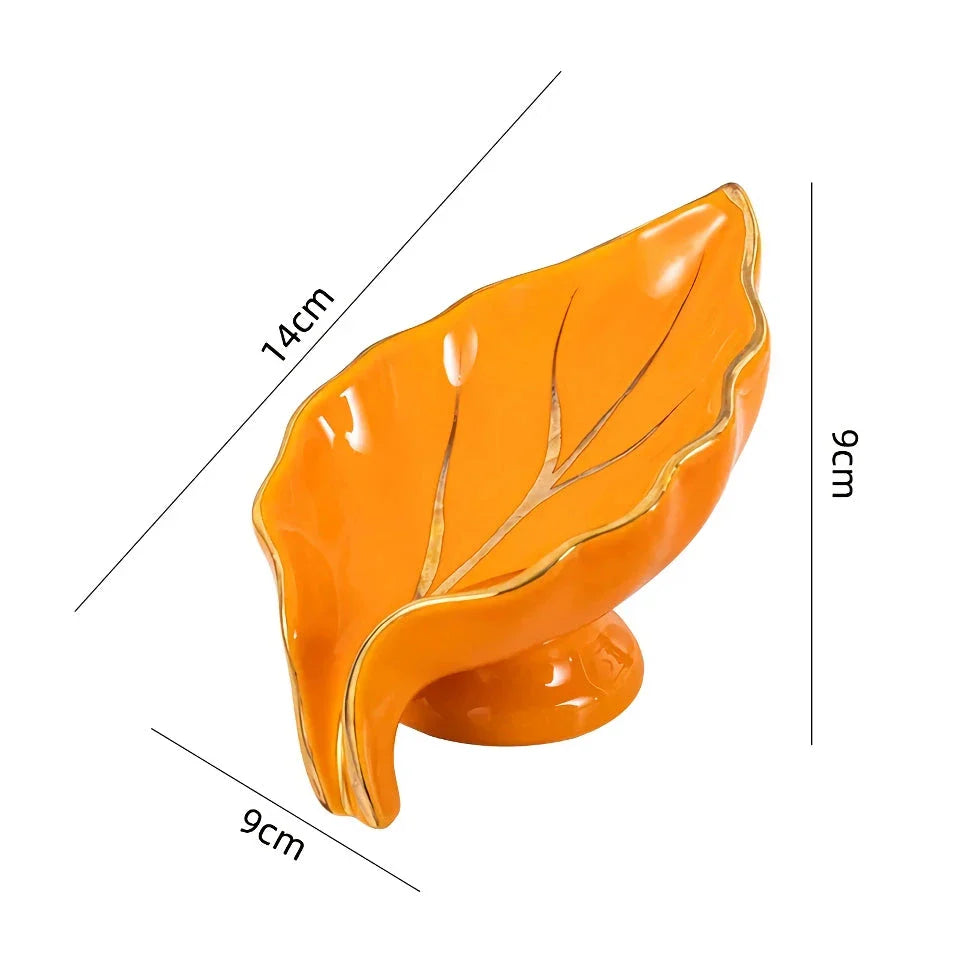 Elegant ceramic leaf-shaped soap dish with a heart design, perfect for adding a touch of nature-inspired luxury to your bathroom decor