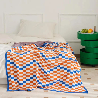 Cozy and stylish plaid blanket in blue, perfect for home decor, travel, and outdoor activities
