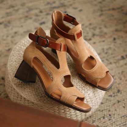 Elegant leather gladiator sandals with adjustable buckle closure and square high heel for stylish summer occasions