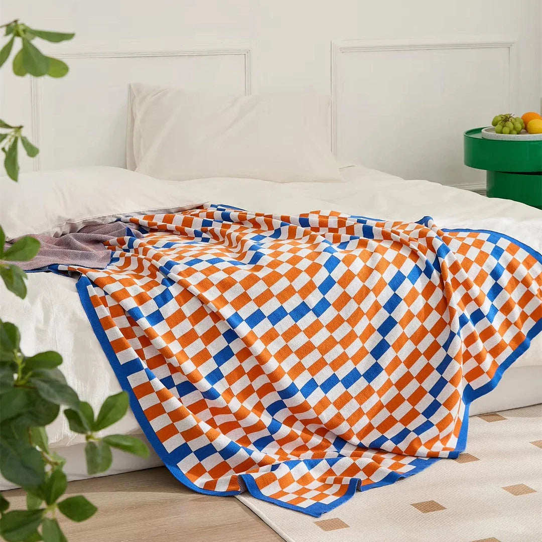 Cozy and stylish plaid blanket in blue, perfect for home decor, travel, and outdoor activities