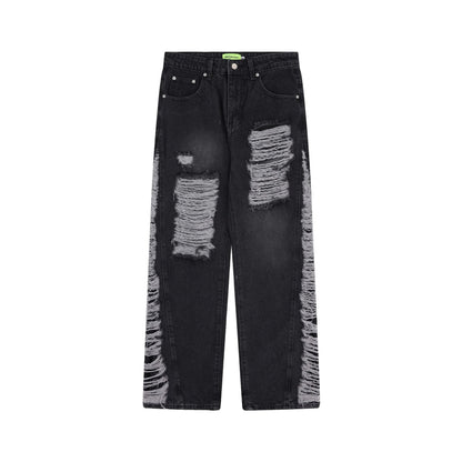 Premium loose fit distressed denim trousers for men and women, featuring a relaxed silhouette, high-quality cotton construction, and trendy distressed details.