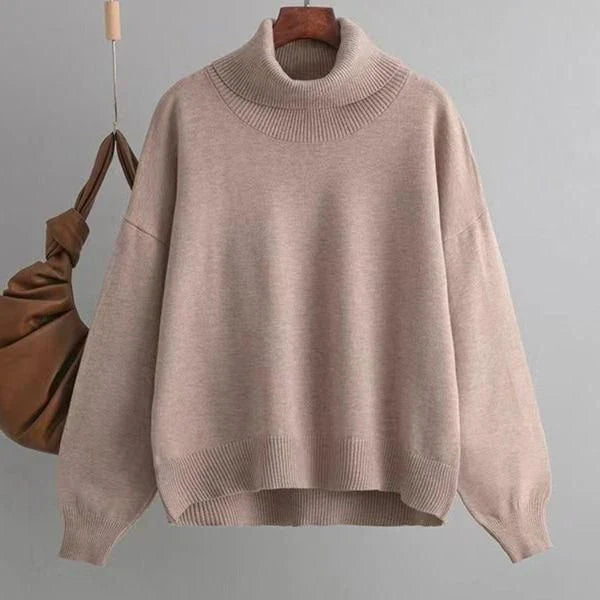 Chic and cozy oversized turtleneck sweater for women in a solid color, perfect for cold weather fashion and style