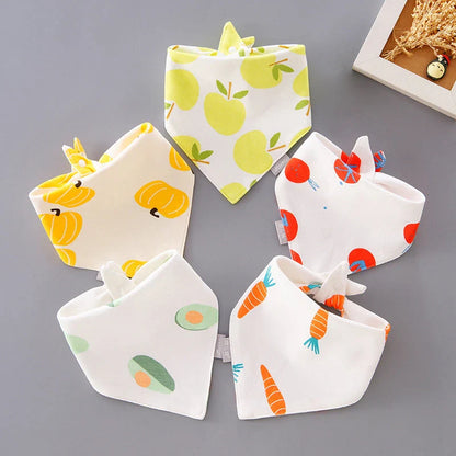 Fashionable cotton baby bandana bibs in various prints, with waterproof backing and adjustable design
