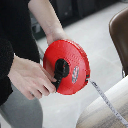 Heavy-duty fiberglass tape measure with double-sided printing and smooth manual crank for precise measurements in woodworking and construction projects