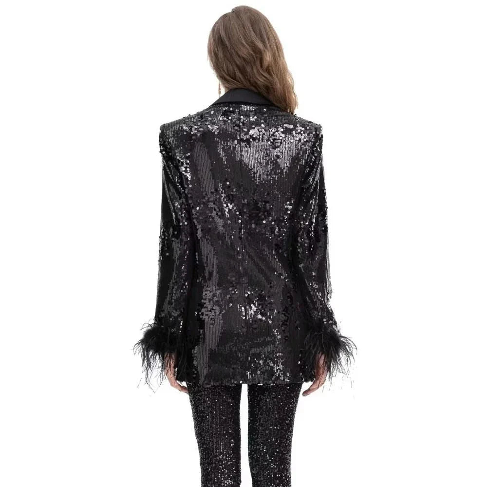 Elegant double-breasted blazer with feather and sequin details, offering timeless style and versatility for any occasion.