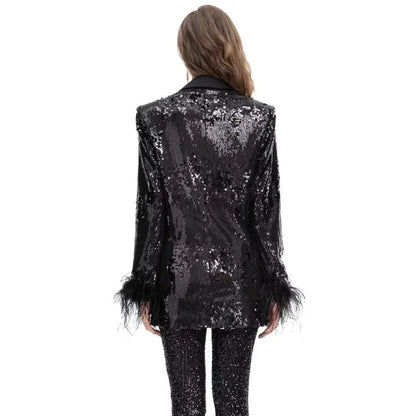 Elegant double-breasted blazer with feather and sequin details, offering timeless style and versatility for any occasion.