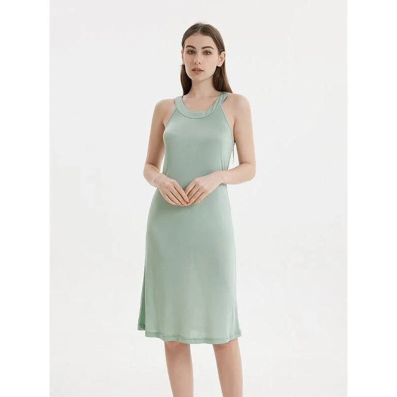 Elegant silk-blend halter neck midi dress in green and white colors, showcasing a chic and versatile design for modern American women.