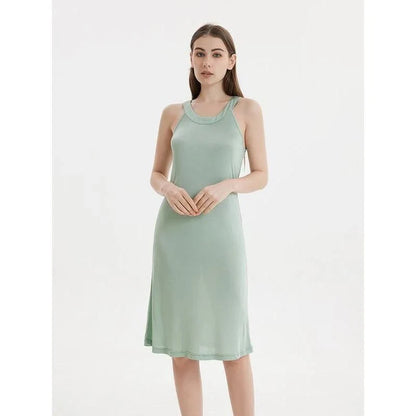 Elegant silk-blend halter neck midi dress in green and white colors, showcasing a chic and versatile design for modern American women.