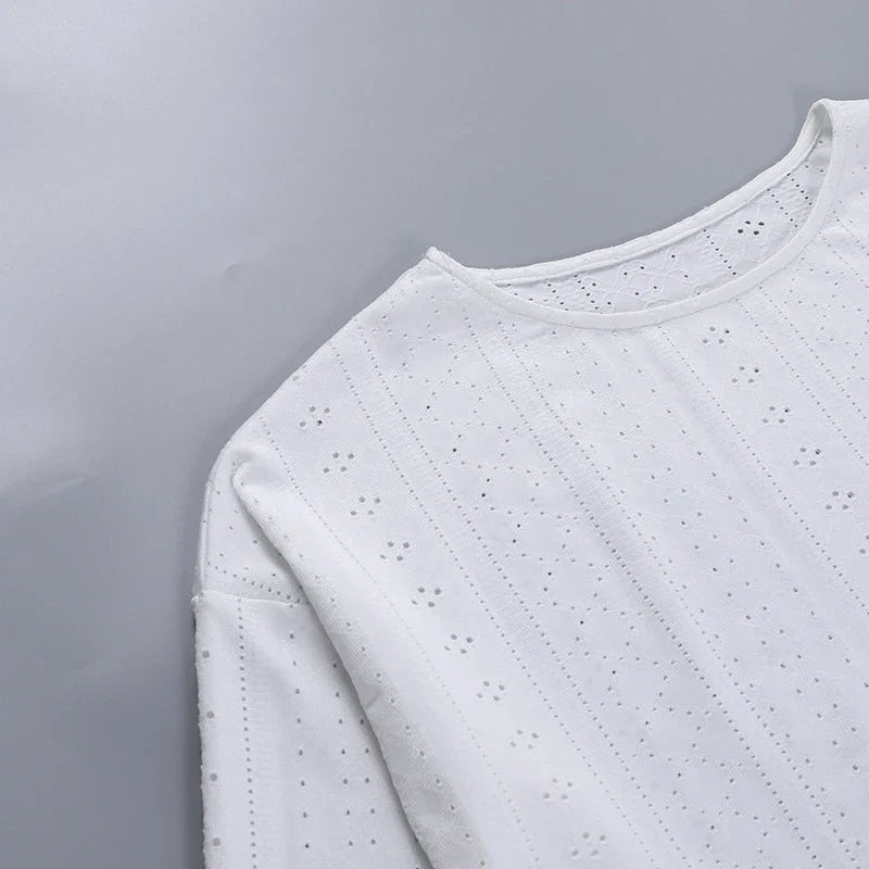 Trendha Women's Long Sleeve Pullover Top and Shorts Set in White, featuring a chic hollow-out design and flattering slim fit