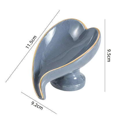 Elegant ceramic leaf-shaped soap dish with a heart design, perfect for adding a touch of nature-inspired luxury to your bathroom decor