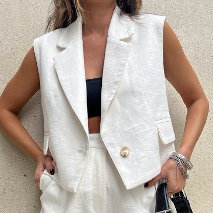 Fashionable white tailored collar vest and matching shorts set with stitched details for a refined, versatile look