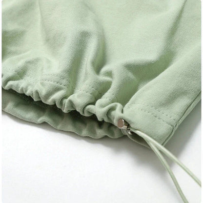 Cozy cotton pullover with zipper detail, available in purple, black, and gray colors