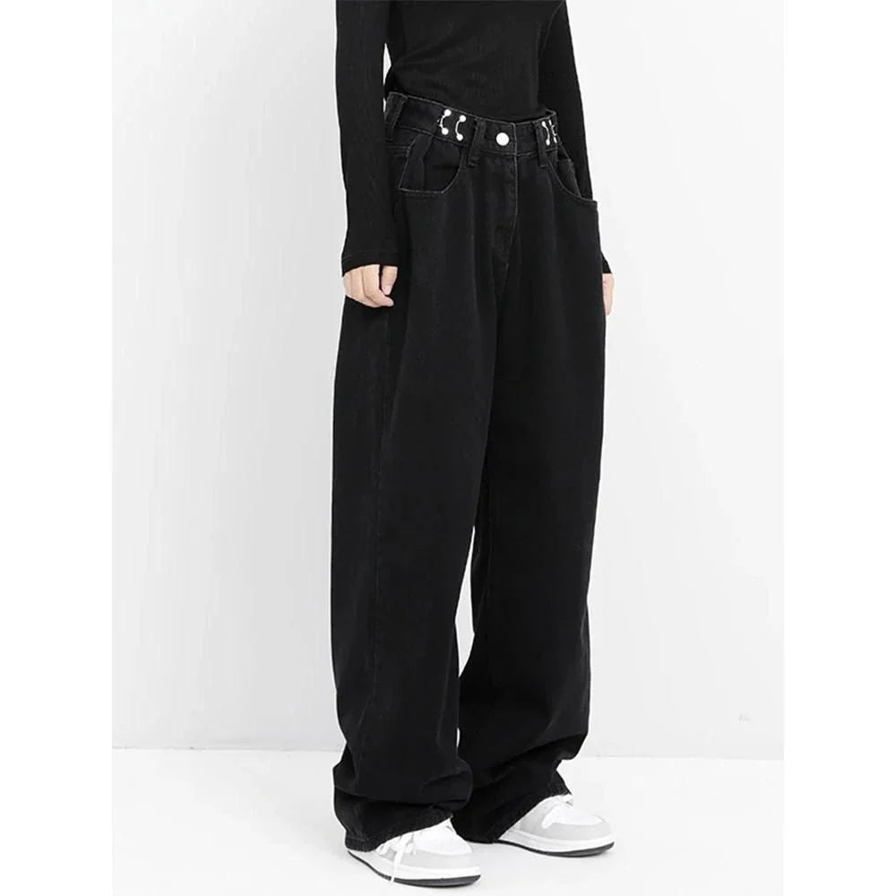 A pair of high-waist black jeans with a relaxed wide-leg design, perfect for effortless style and comfort.