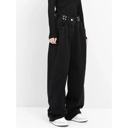 A pair of high-waist black jeans with a relaxed wide-leg design, perfect for effortless style and comfort.