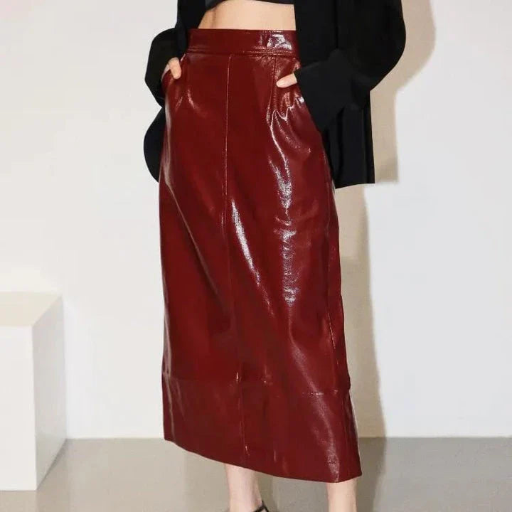 Reflective leather midi pencil skirt with a flattering high-waist design and eye-catching reflective material