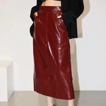 Reflective leather midi pencil skirt with a flattering high-waist design and eye-catching reflective material